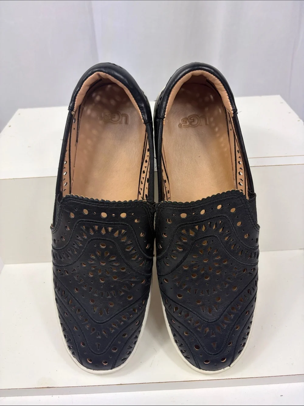 UGG CAS‎ Perforated Slip On Sneaker in Black.